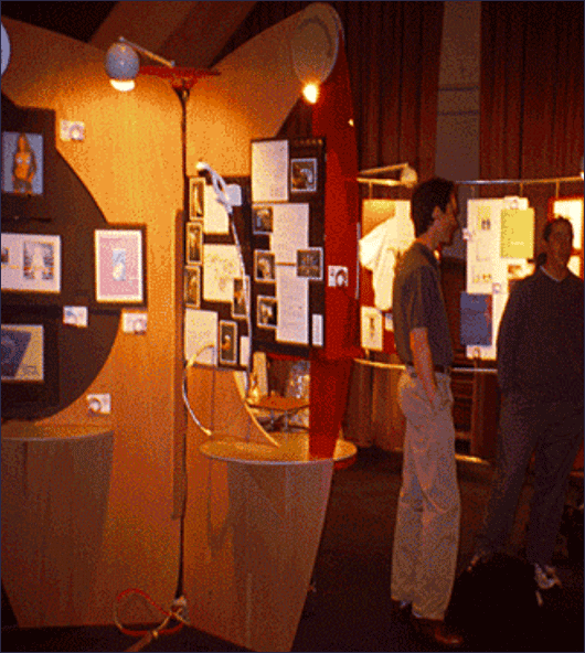 People viewing graphic design exhibit