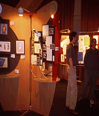 People viewing graphic design exhibit